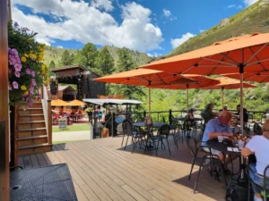 Outdoor Dining overlooking the Poudre River at The Mishawaka on Hwy 14 Poudre Canyon Scenic Byway near Livermore & Red Feather Lakes, Colorado