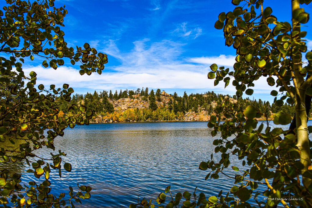 View of Lake Erie Framed by Aspen Leaves in Crystal Lakes near Red Feather Lakes, Colorado