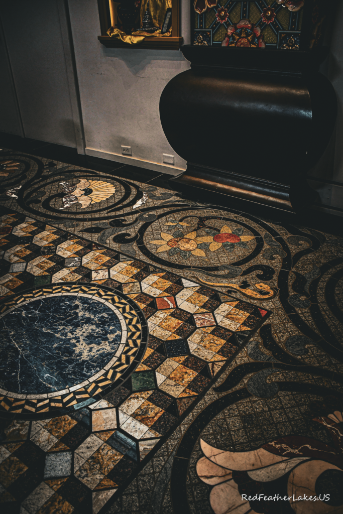 Intricate decorative mosaic floor design with patterns.
