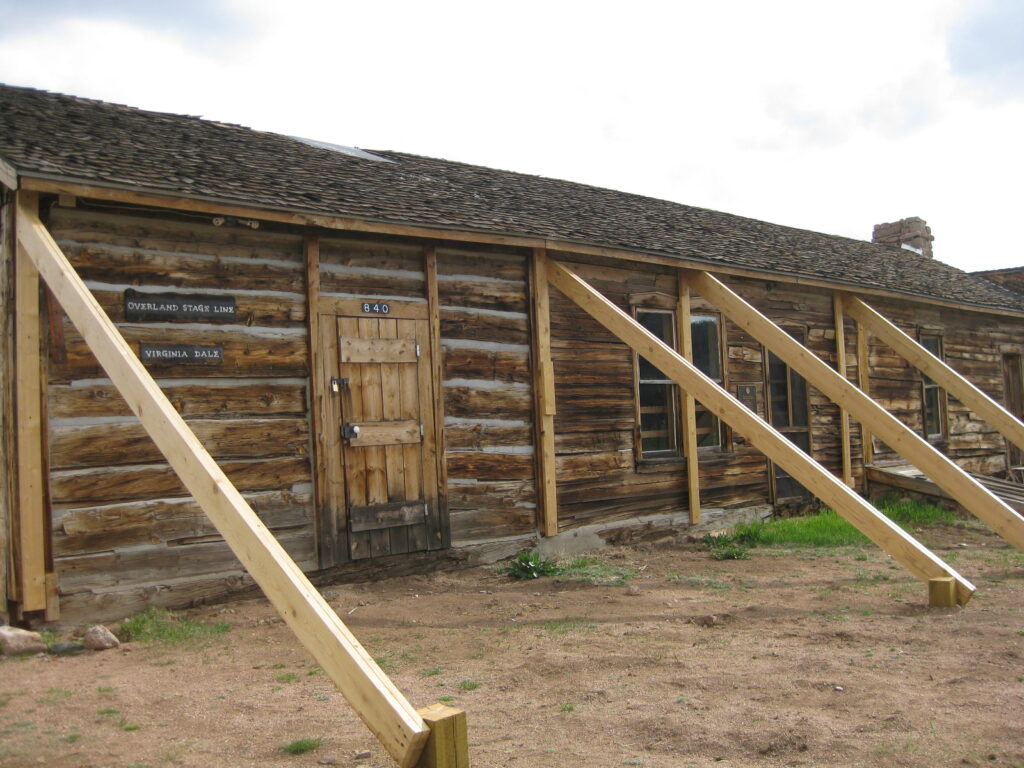 Old wooden building with supporting beams