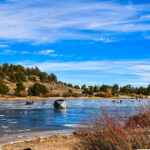 Ice Fishing Under Blue Skies at West Lake in Red Feather Lakes Colorado Ice Fishing Under Blue Skies at West Lake in Red Feather Lakes Colorado
