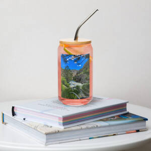 Pink citrus drink on books with landscape design