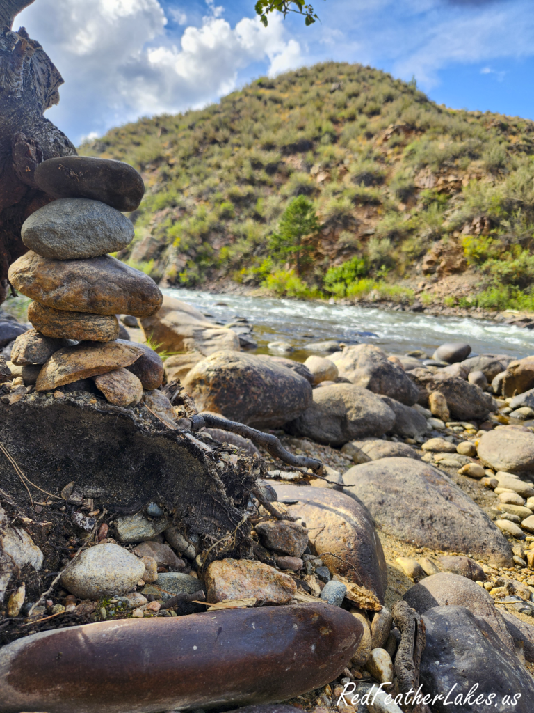 20250830_160755 Rock cairn at a campground along the Poudre River in Poudre Canyon, Larimer County Colorado