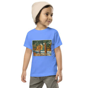 Child wearing blue graphic river T-shirt