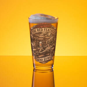 Pint glass of beer with moose illustration