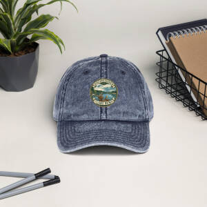 Washed denim cap with lake-themed patch