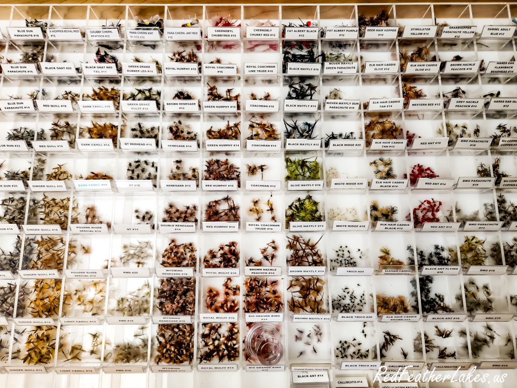 A wall of hand-tied fishing flies at the Trading Post Resort, including the Poudre River Special, for the Upper Poudre