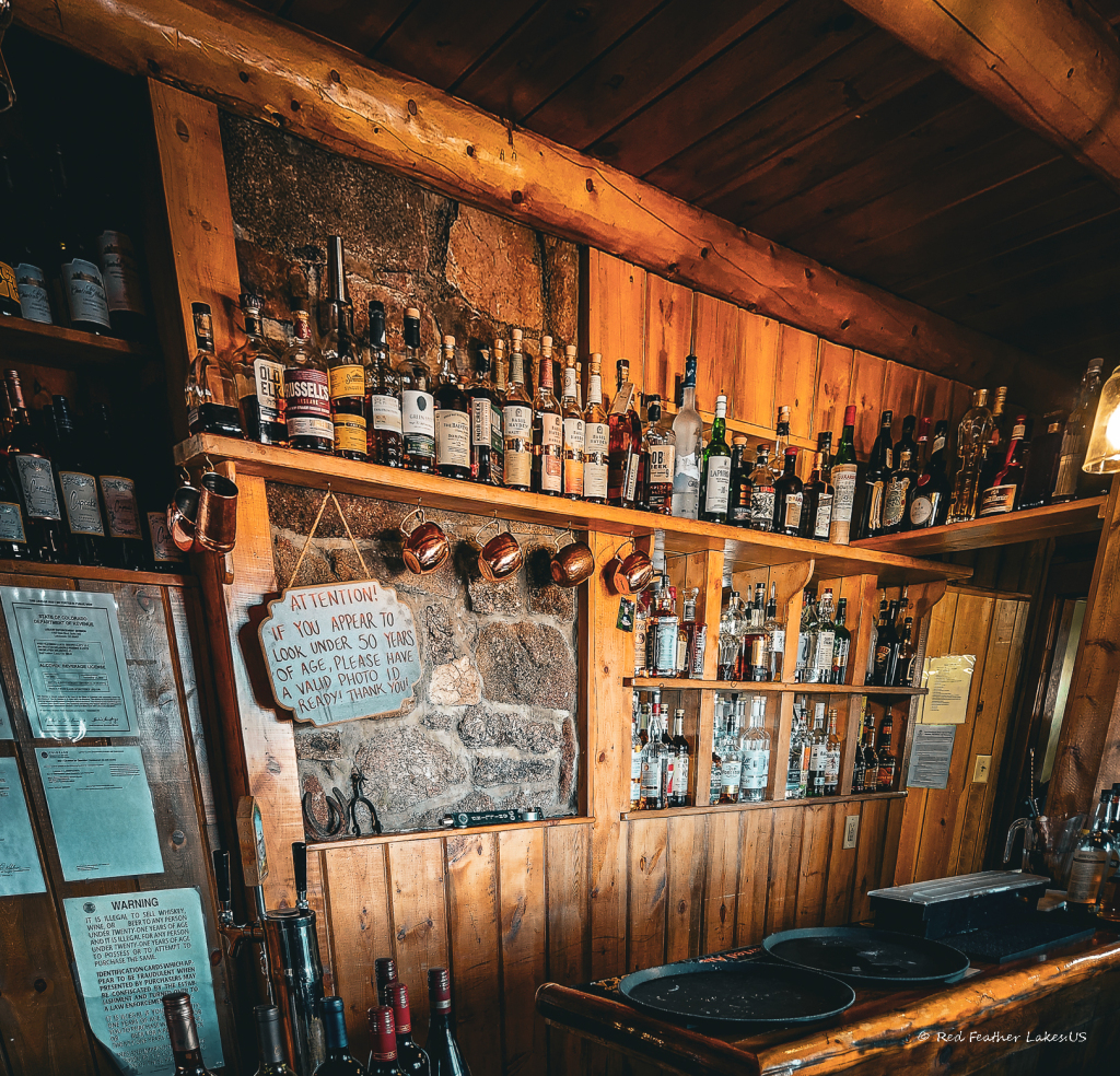 The log cabin bar at the Ranch House Restaurant and Pub at Beaver Meadows near Red Feather Lakes, Colorado