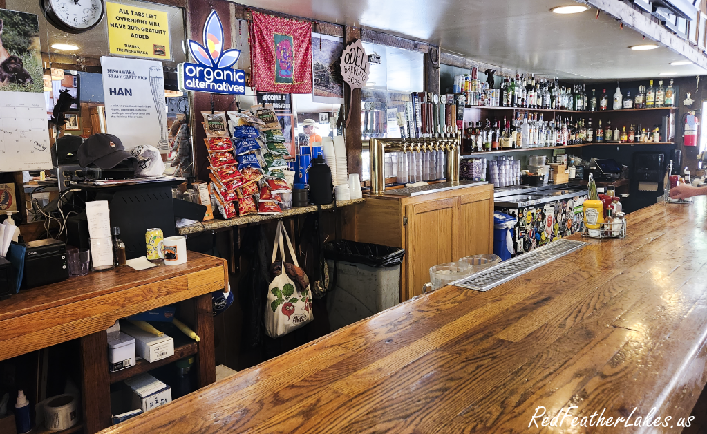 The main bar at the Mishawaka along the Cache la Poudre River in Poudre Canyon, Colorado