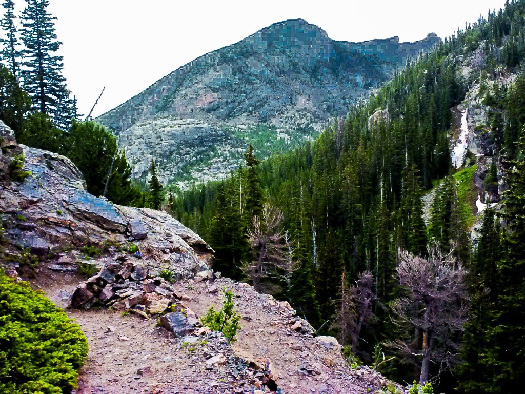 A steep drop-off beside the trail descending from Bear Lake toward Alberta Falls, Rocky Mountain National Park