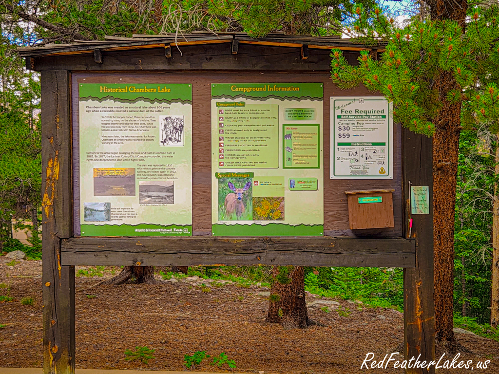 Interpretive sign at Chambers Lake telling the history of the lake and fur trapper Robert Chambers, Arapaho & Roosevelt National Forest