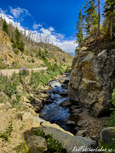 A cold snowmelt creek running beside the climbing section of Long Draw Road