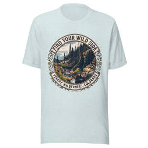 Light blue unisex t-shirt with a vintage circular badge reading Find Your Wild Side, Poudre Wilderness Colorado, over a mountain creek and forest