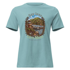Heather blue women's relaxed t-shirt with artwork reading Say Less, Live More over a Cache la Poudre canyon river scene