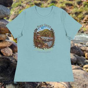 Heather blue lagoon Say Less, Live More — Cache la Poudre Women's Relaxed Tee, front view